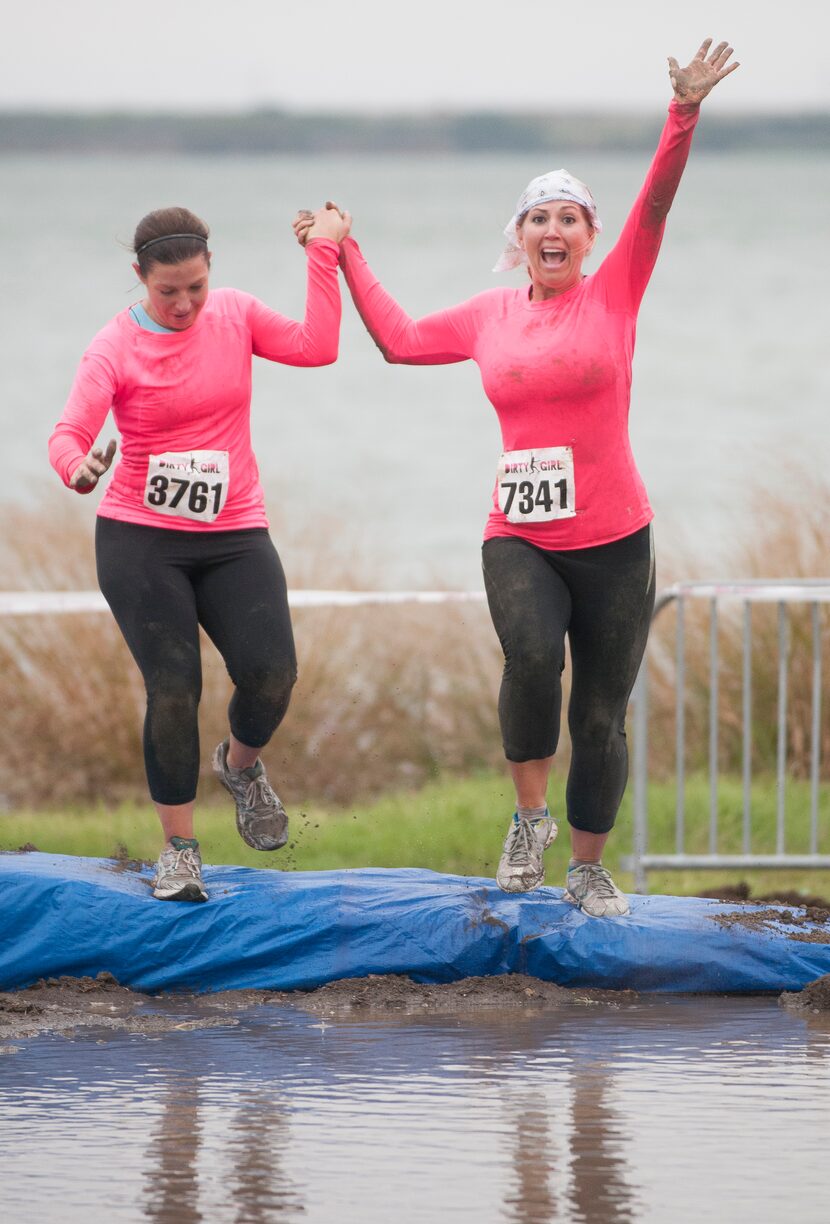 Women competing in the Dirty Girl Mud Run at Cedar Hill State Park on Saturday, Oct. 6, 2012.  