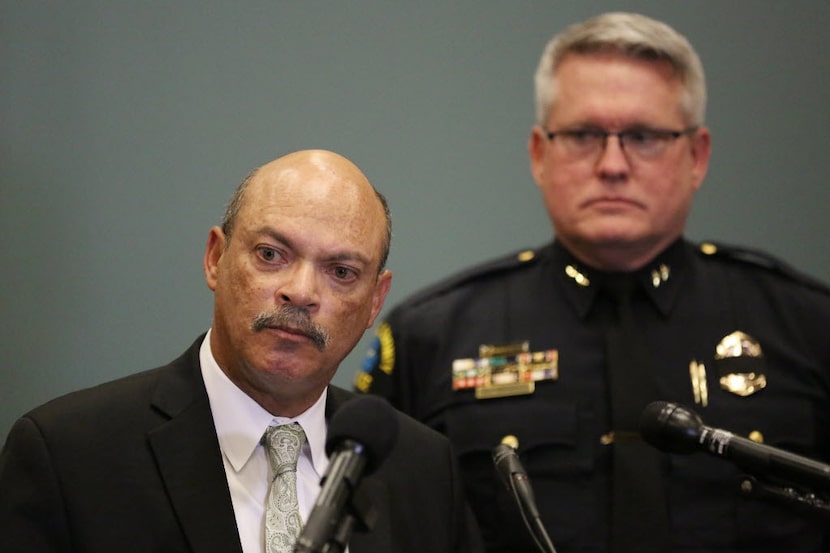 Dr. Jose Adames (left), president of El Centro College, and El Centro police Chief Joseph...