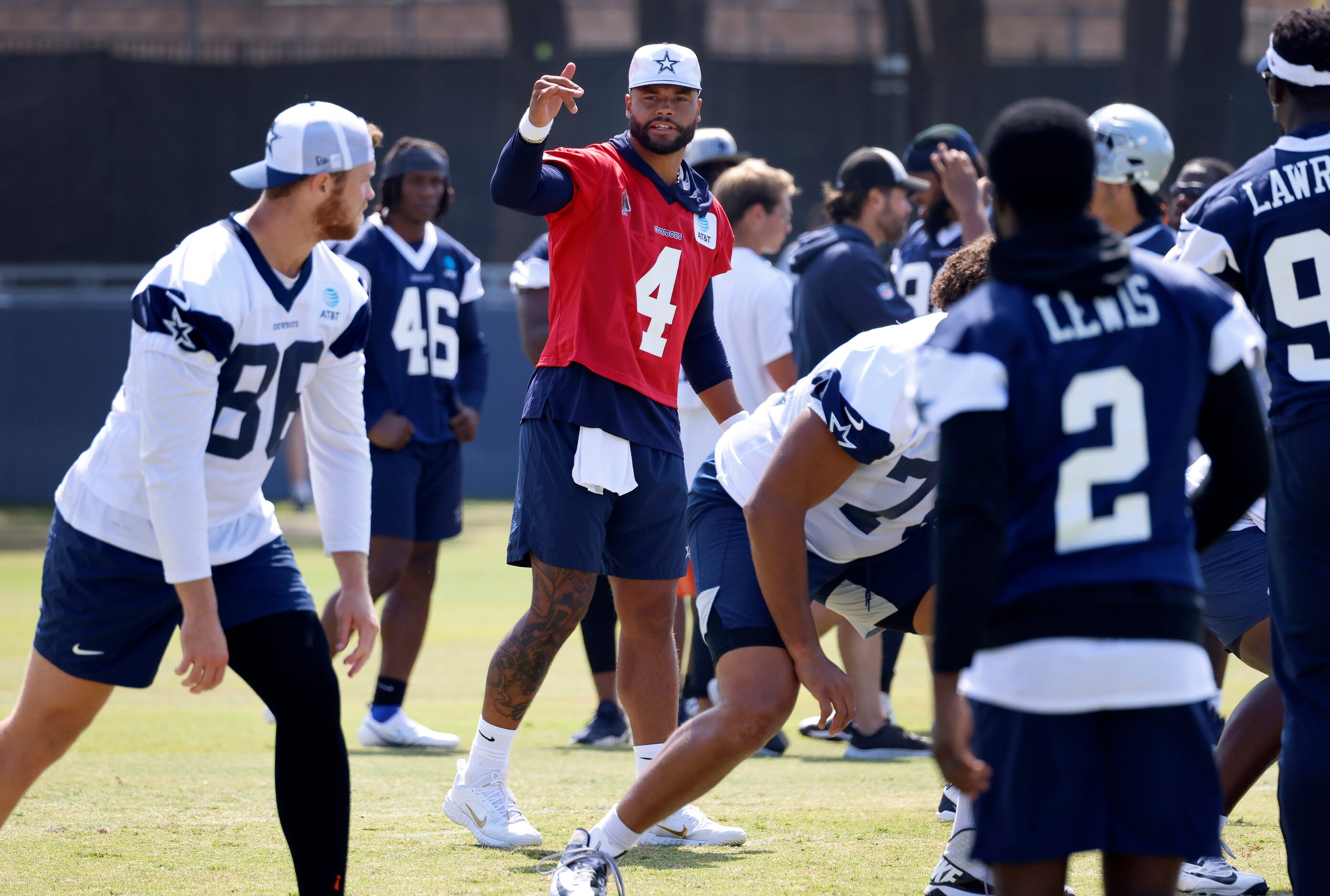 Dallas Cowboys quarterback Dak Prescott (4) calls a play during a mock game walk thru at...