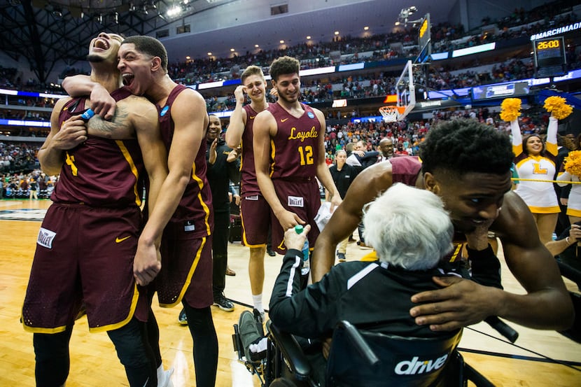 The Loyola Ramblers celebrate a 63-62 win against Tennessee in the second round of the NCAA...