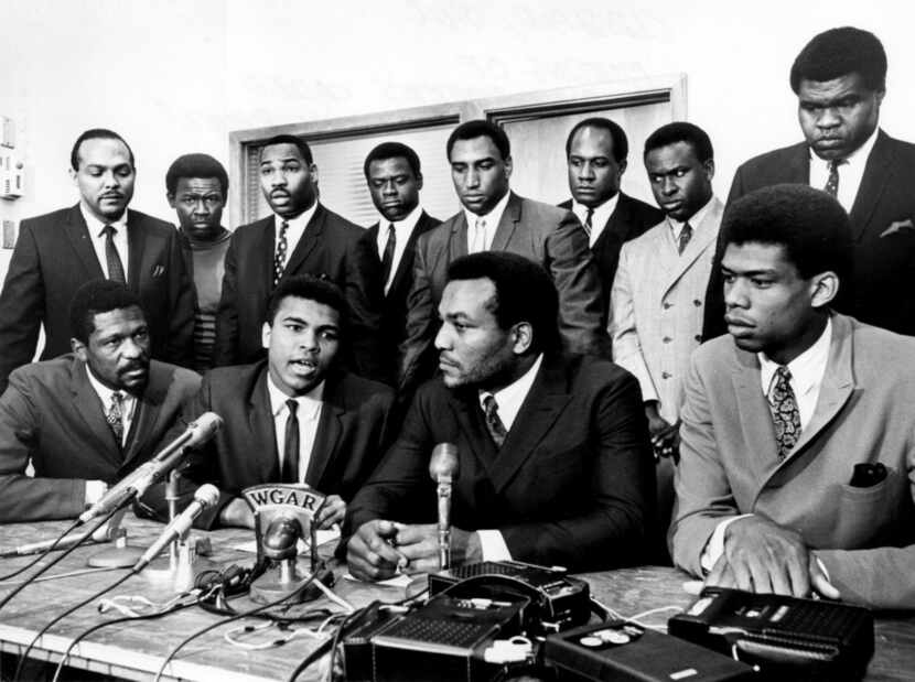 Former Cleveland Browns Hall of Fame running back Jim Brown presides over a meeting of top...