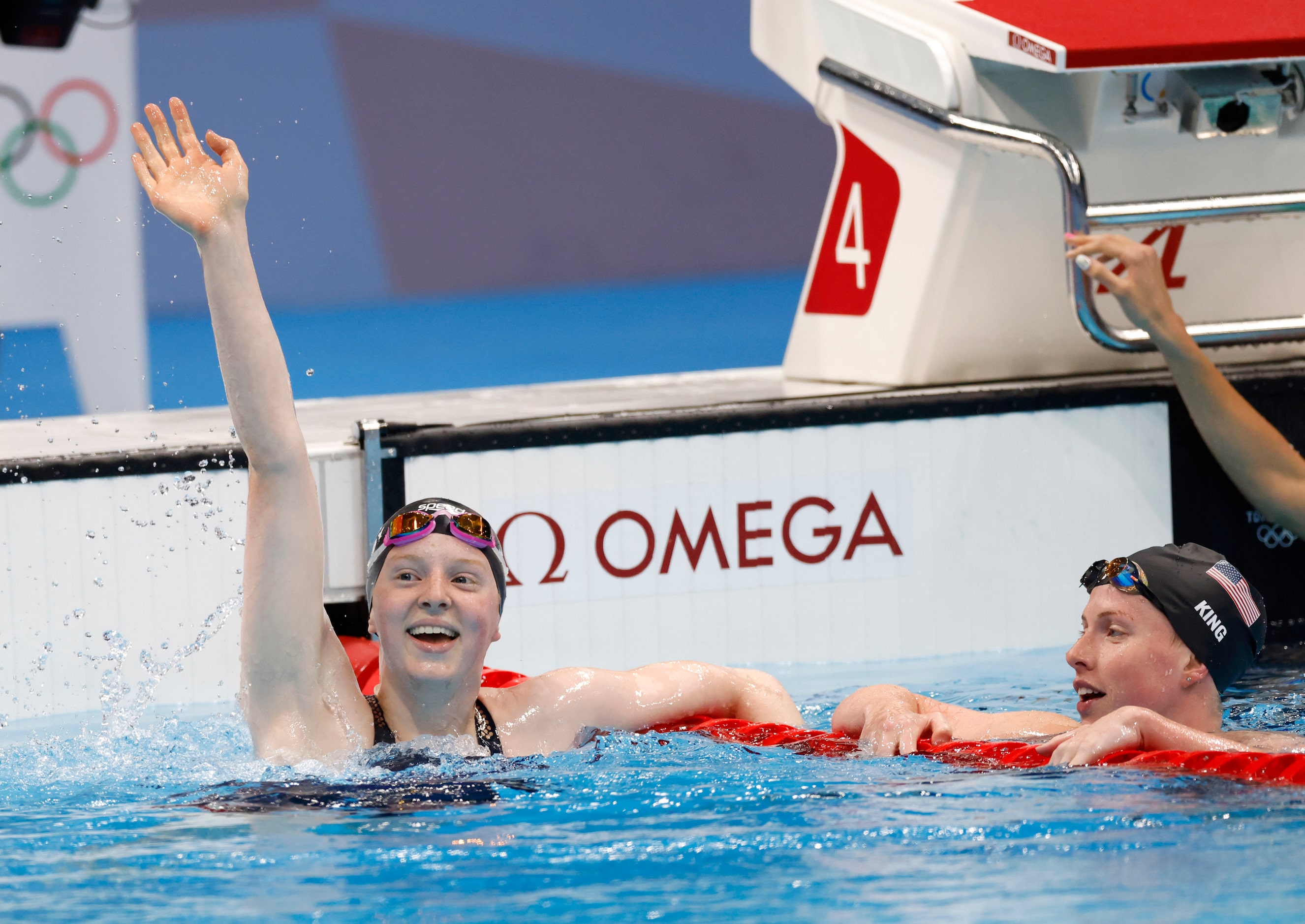 USA’s Lydia Jacoby celebrates with Lilly King (right) after she took gold in the women’s 100...