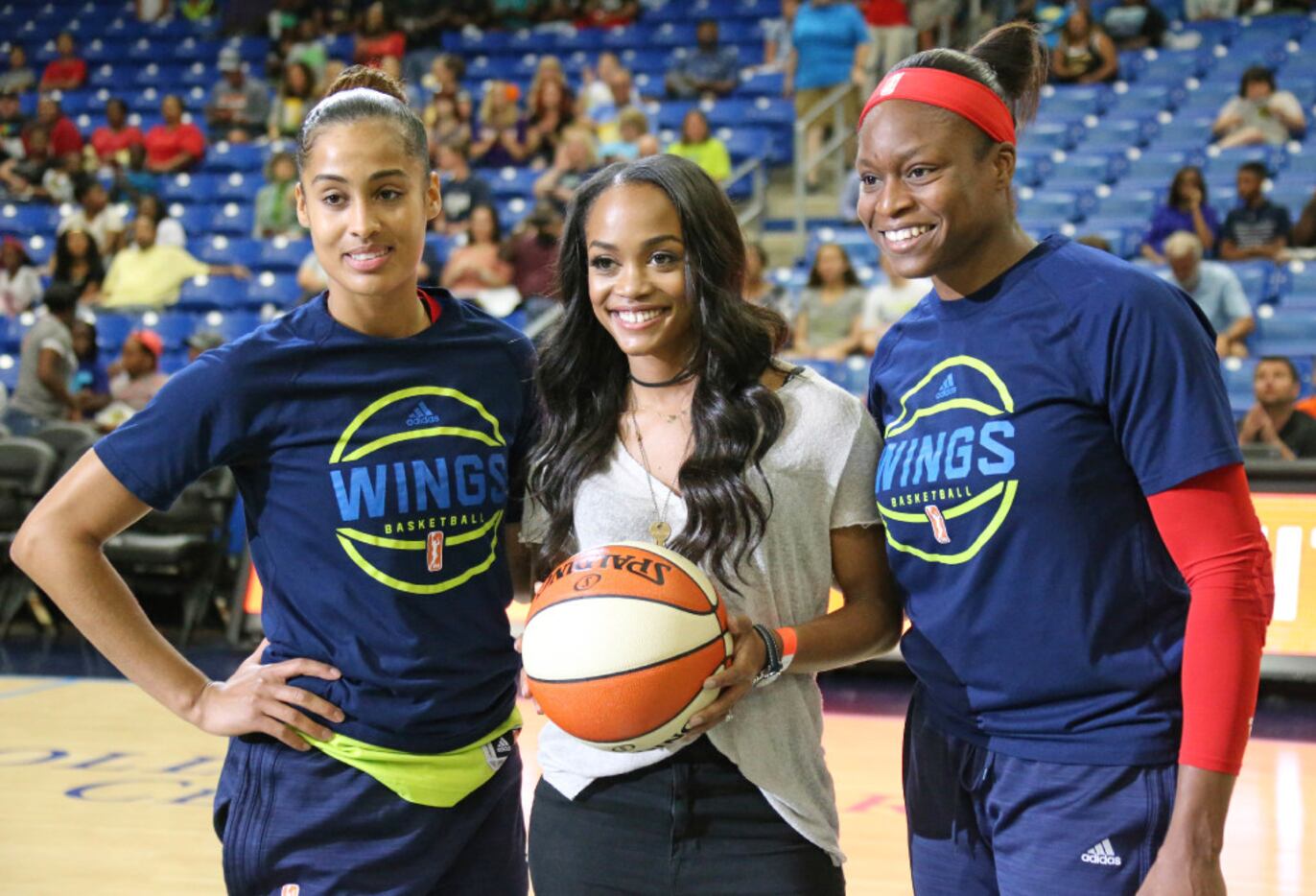 Dallas native and latest Bachelorette Rachel Lindsay, center poses with Dallas Wings Skylar...