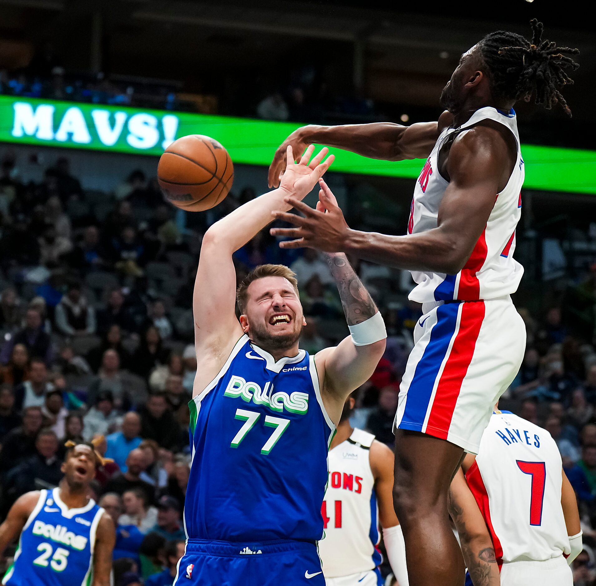 Dallas Mavericks guard Luka Doncic (77) is fouled as he tries to drive to the hoop against...