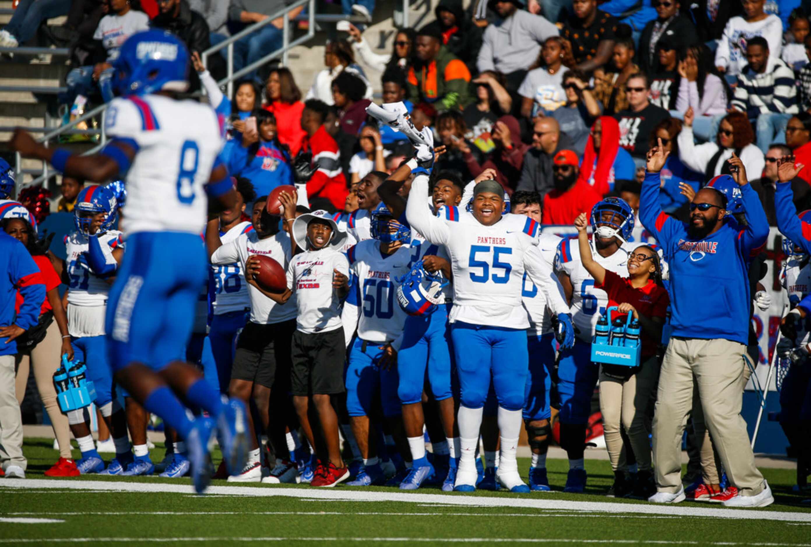 The Duncanville sideline gets pumped up during the first half of a Class 6A Division I...