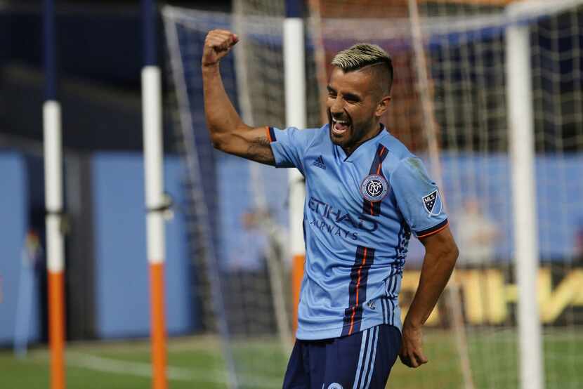 New York City FC midfielder Maximiliano Moralez celebrates after he scored a goal during the...