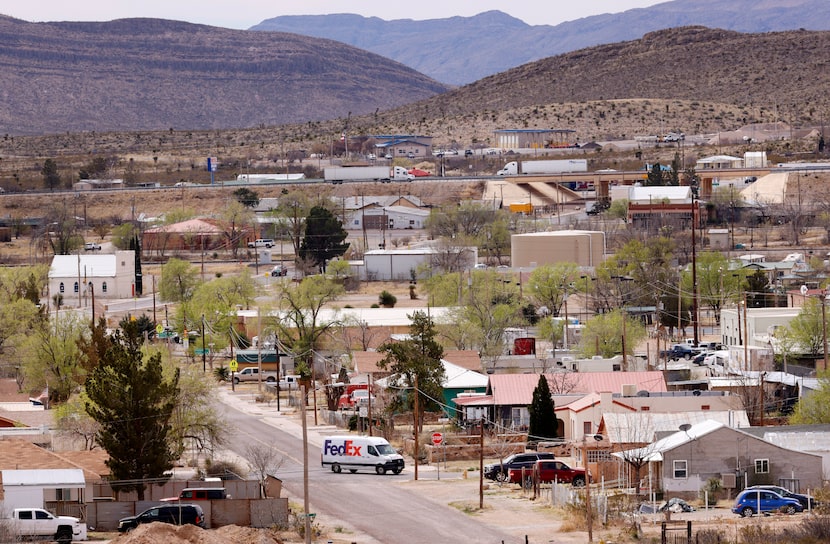 Trucks on Interstate 10 and in town pass through Sierra Blanca, Texas, March 22, 2023.