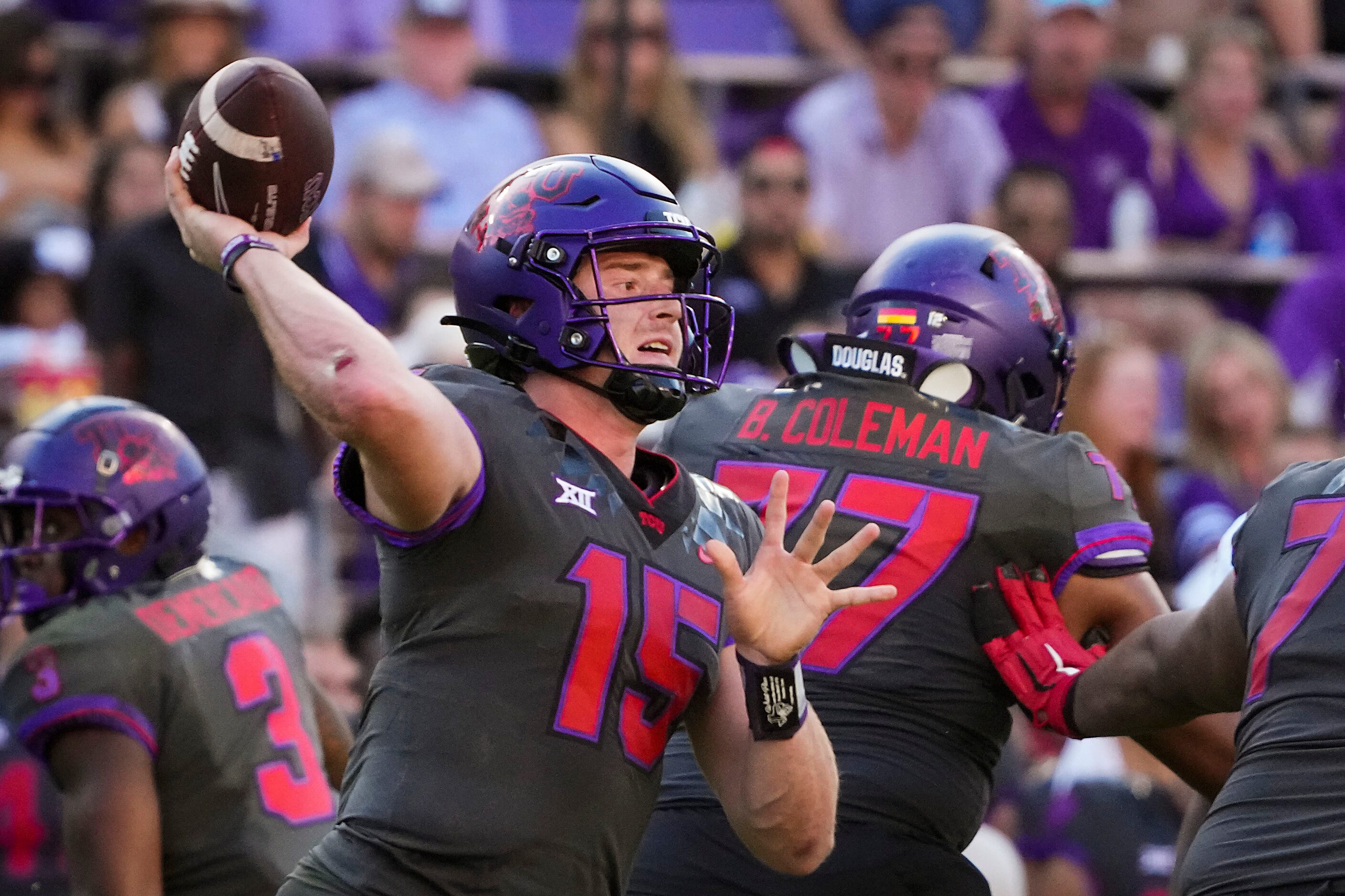 TCU quarterback Max Duggan (15) throws a pass during the second half of an NCAA football...