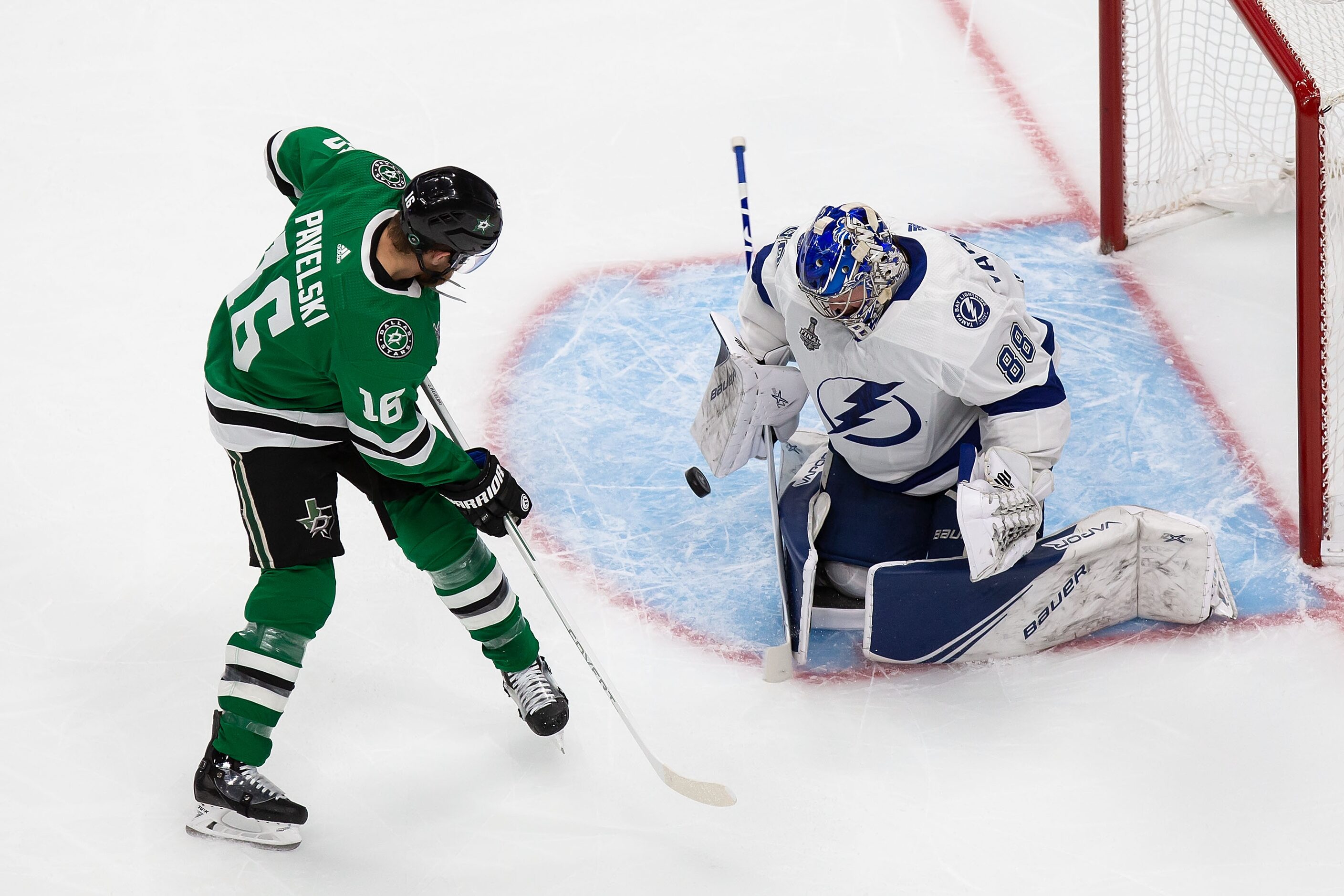 Joe Pavelski (16) of the Dallas Stars takes a shot on goaltender Andrei Vasilevskiy (88) of...