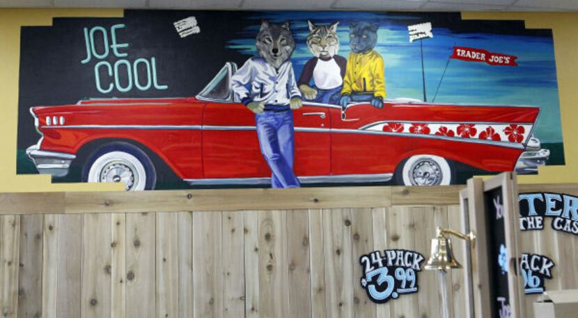 A mural on display with the three senior high school mascots at Trader Joe's in Plano. The...