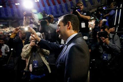  Sen. Ted Cruz waves as he arrives at Liberty University's Vines Center to announce his...