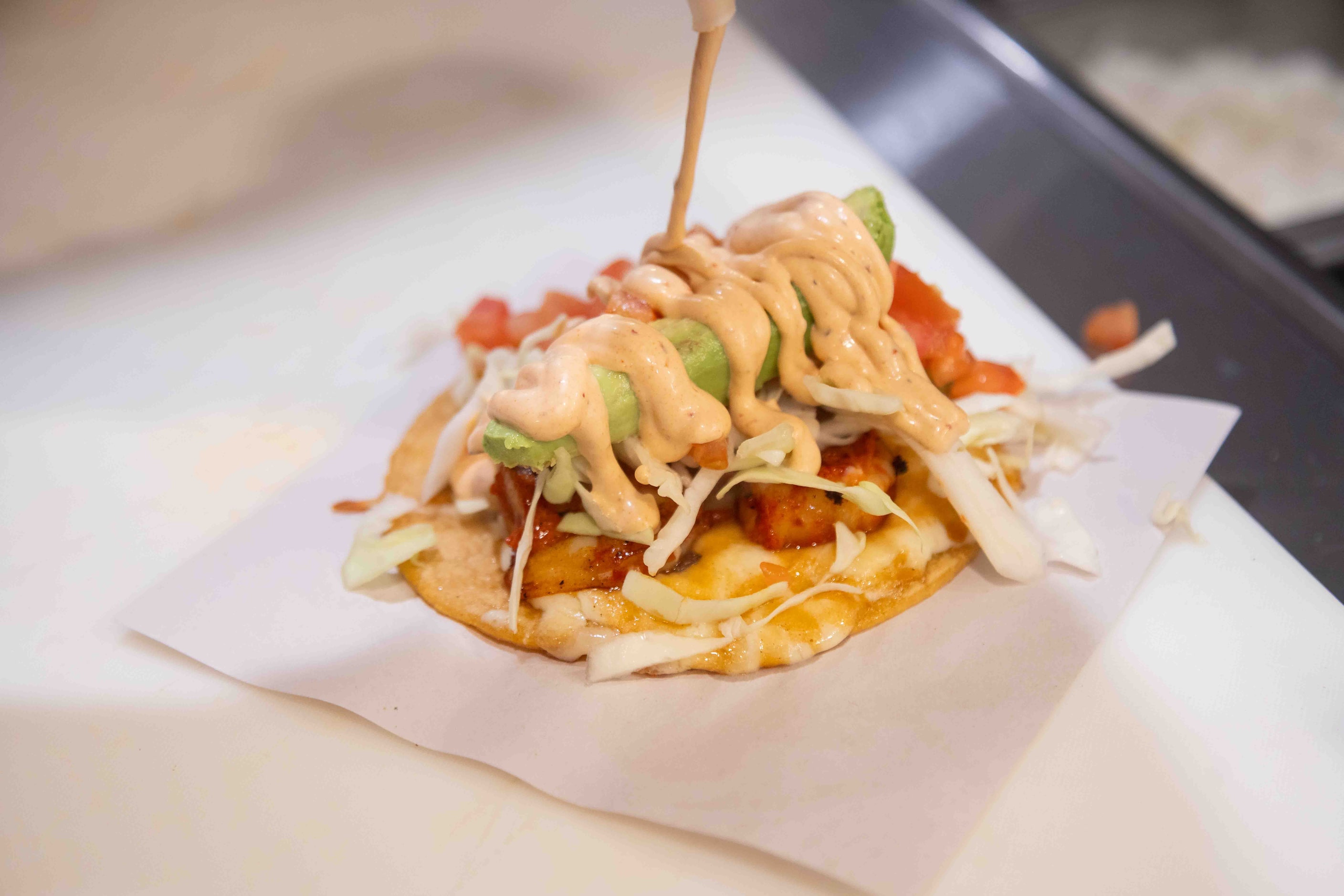 The Camaron taco, which has grilled shrimp, melted cheese, avocado, cabbage, tomato and...