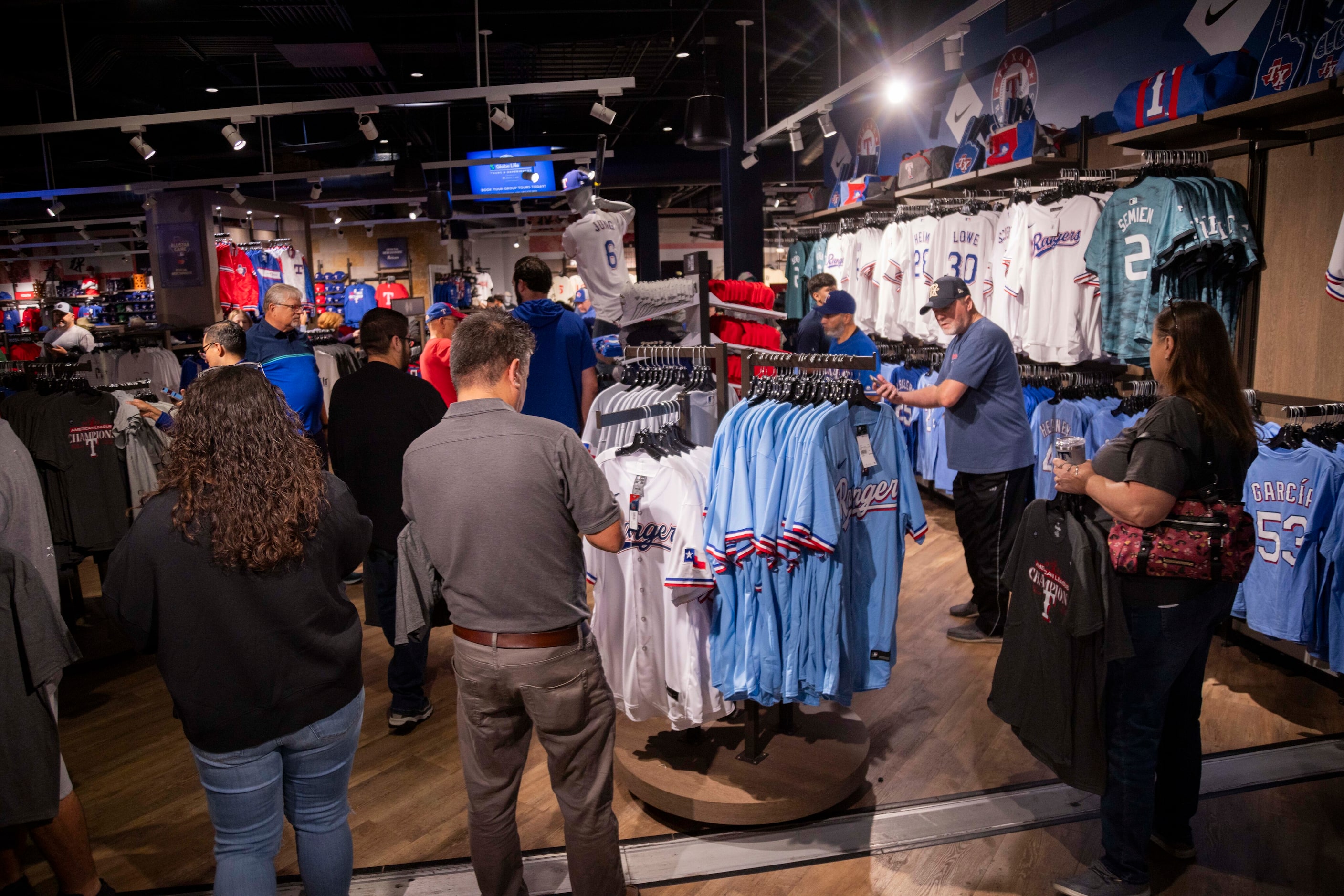 Fans shop at the Grand Slam Team Store in Arlington on Tuesday, Oct. 24, 2023. Texas Rangers...