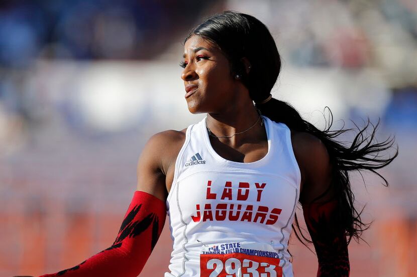 Mesquite Horn's Kaylor Harris (2933) finishes first in the class 6A girls 100-meter hurdles...