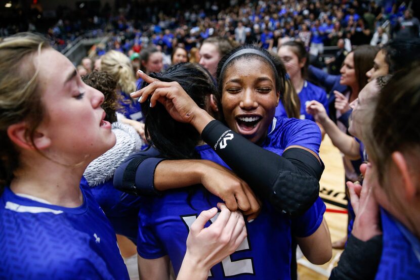 Trophy Club Byron NelsonÃs Charitie Luper (10) celebrates with teammates after winning the...