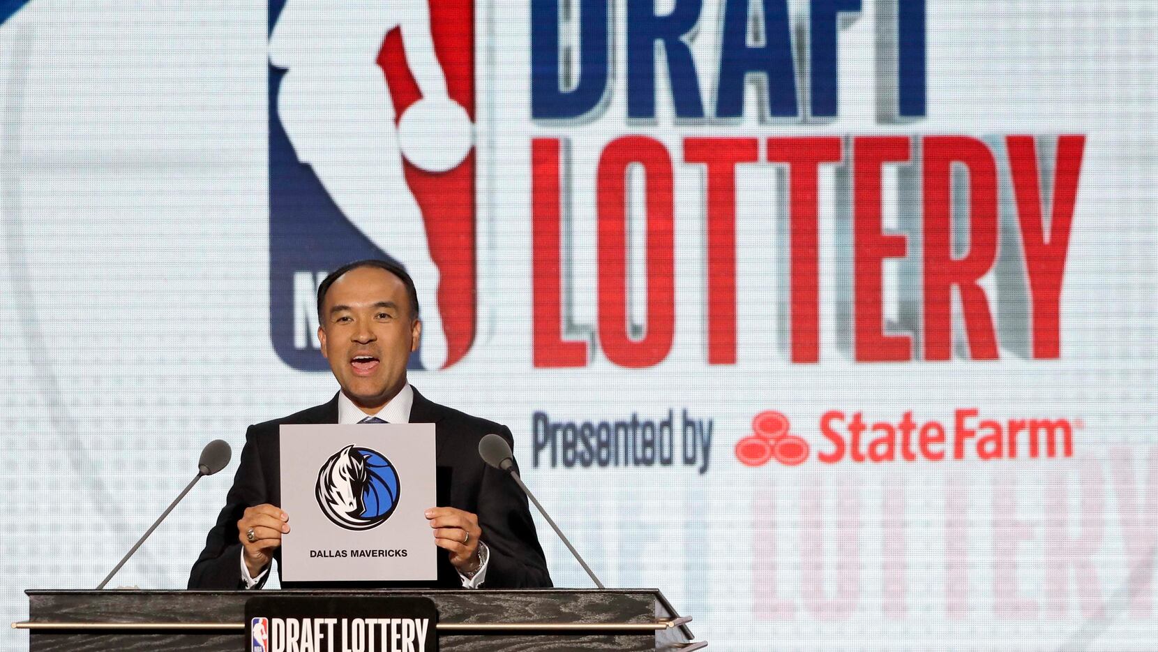 NBA deputy commissioner Mark Tatum announces that the Mavericks had been awarded the fifth...