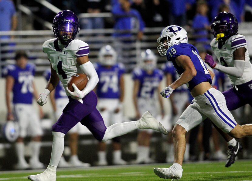 Anna receiver Jabari Finnie (4), left, races past the pursuit of Decatur defensive back Sam...