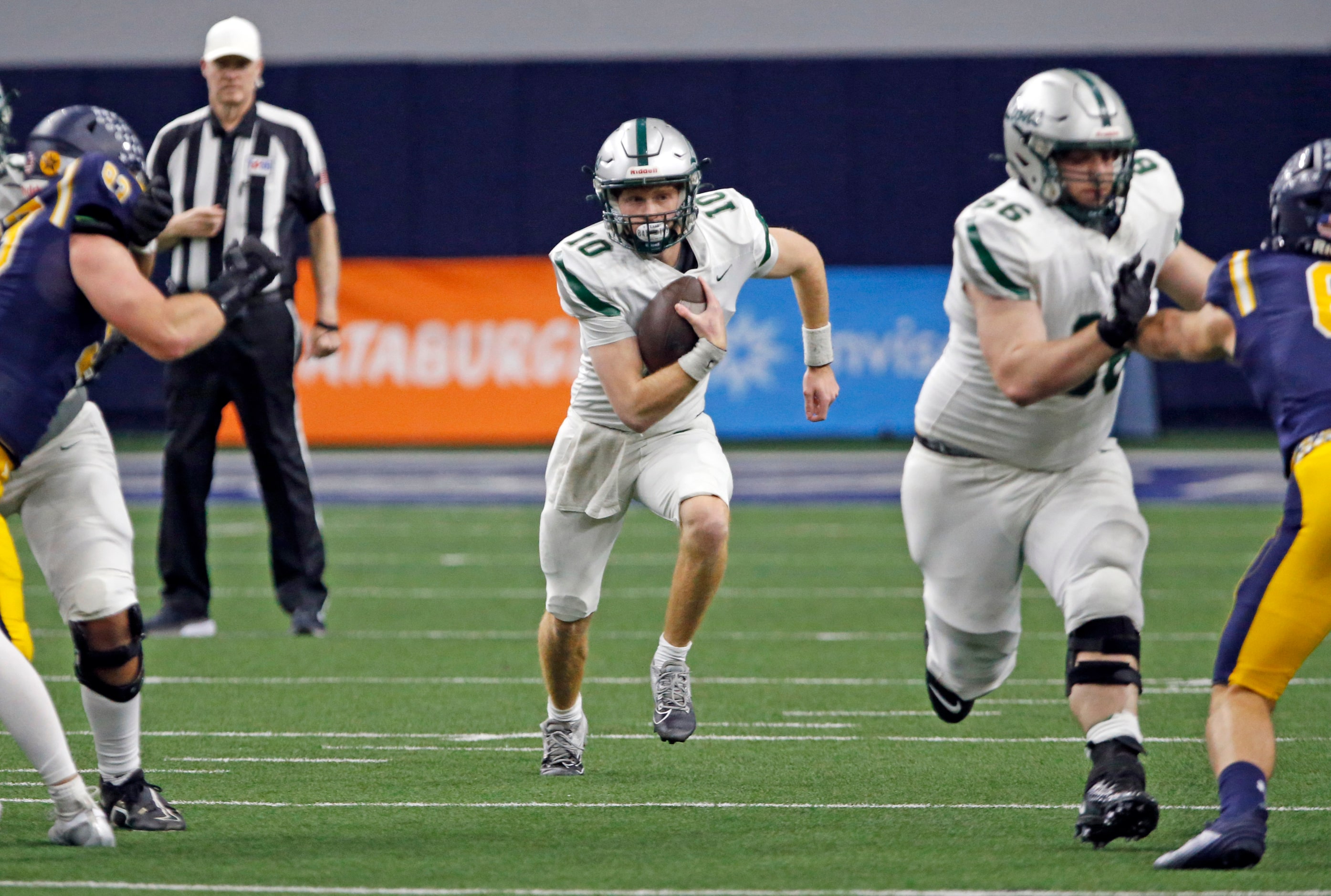 Frisco Reedy High QB Jake Ferner (10) runs for yards during the first half of a high school...