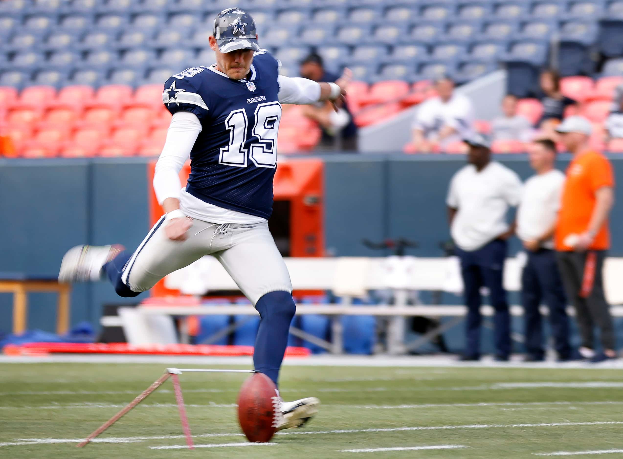 Dallas Cowboys place kicker Brett Maher (19) practices his field goal kicking before their...