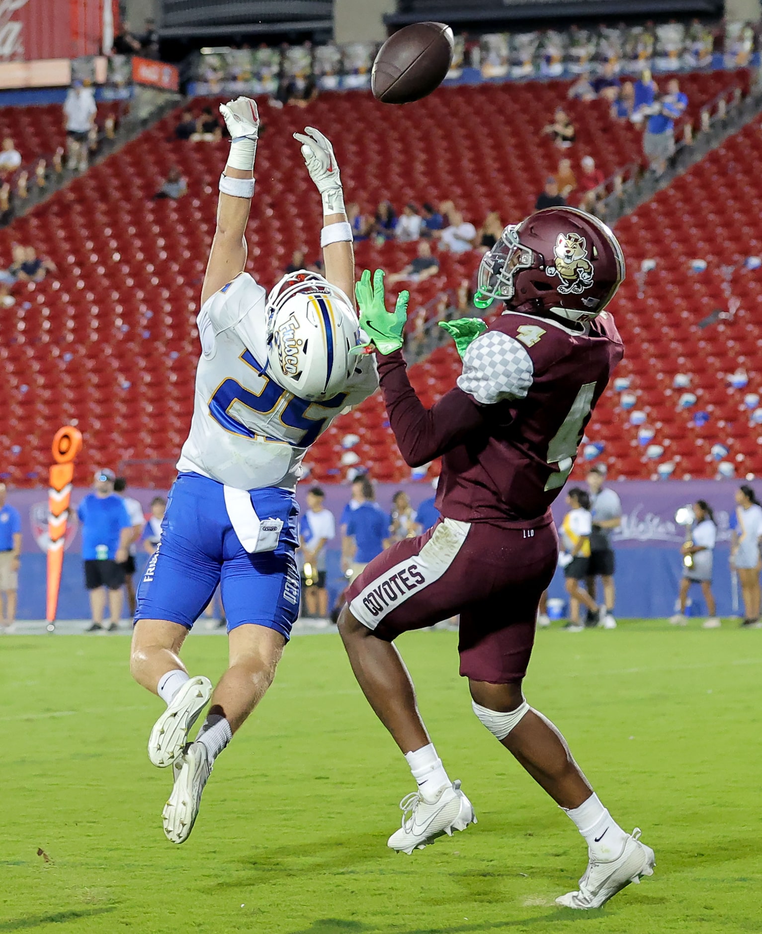 Frisco defensive back Josh Byrd (25) defends a pass intended for Frisco Heritage wide...