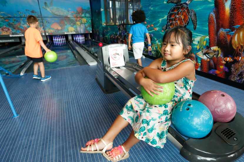 Ellise Bailey patiently waited her turn to bowl at the Children's Learning Adventure bowling...