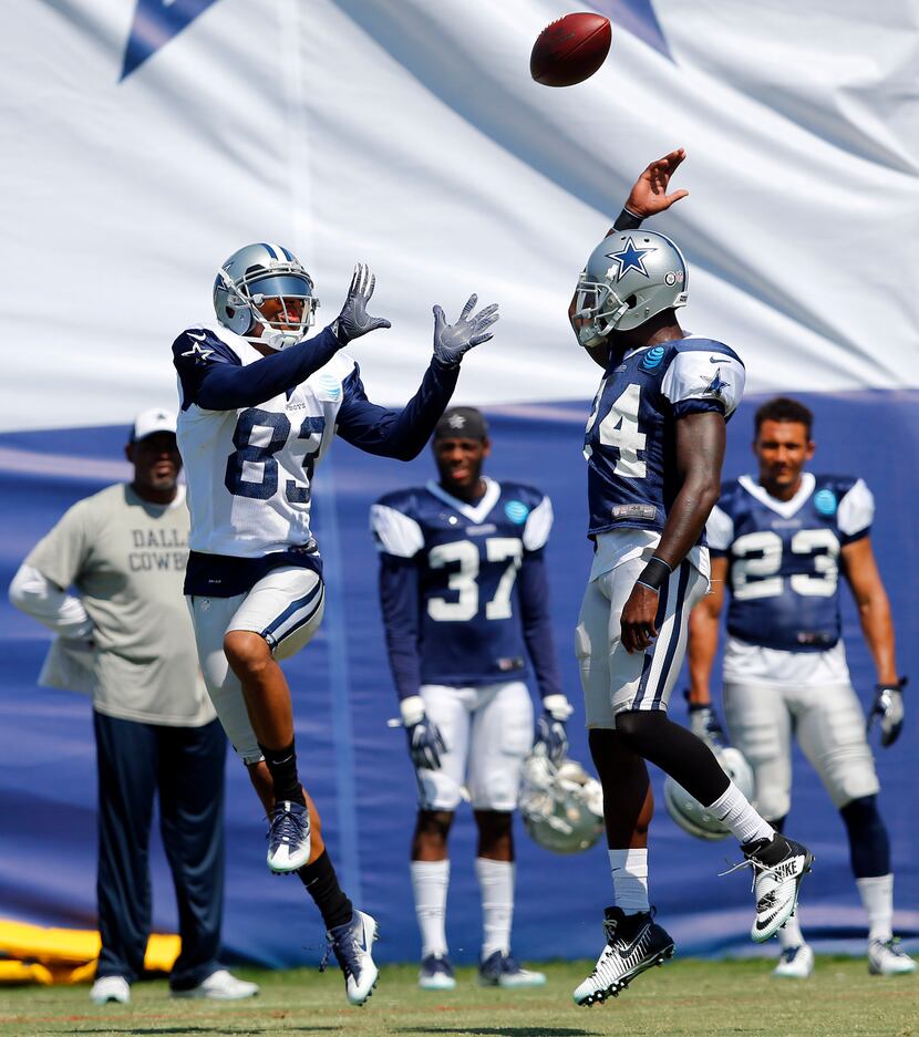 Dallas Cowboys wide receiver Terrance Williams (83) goes up to grab a pass over cornerback...