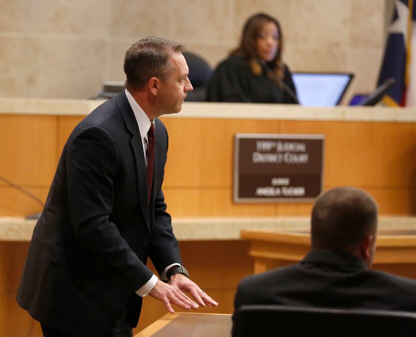 Dewey Mitchell, prosecutor stands next to Robert Veal as he delivers closing arguments...
