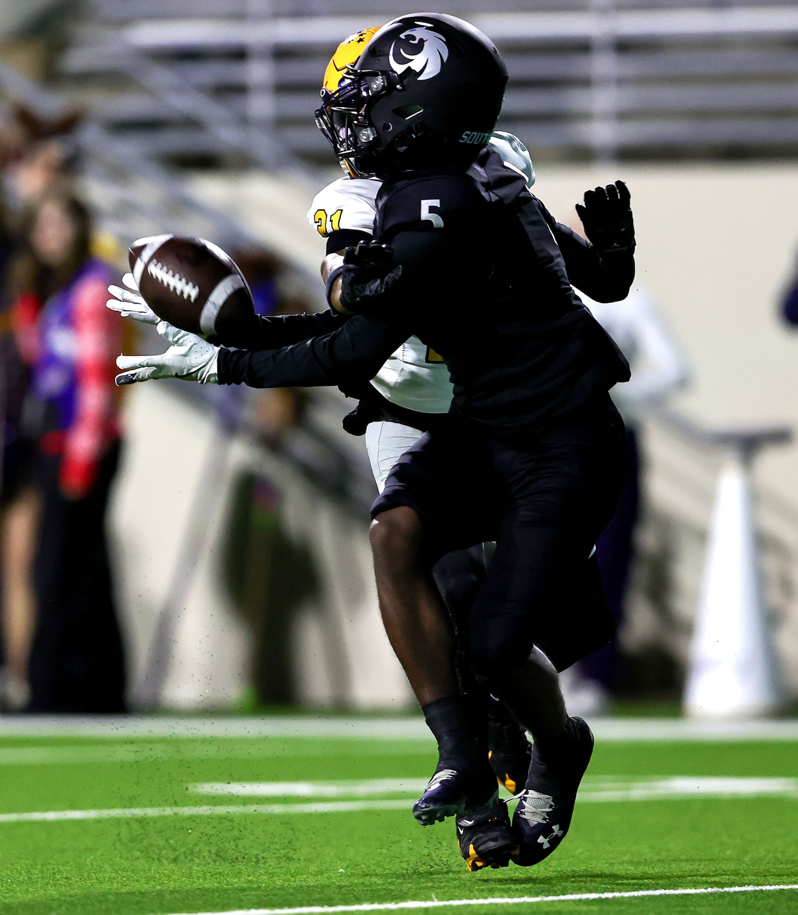 Denton Guyer running back DJ Reese (5) is unable to come up with a reception against...