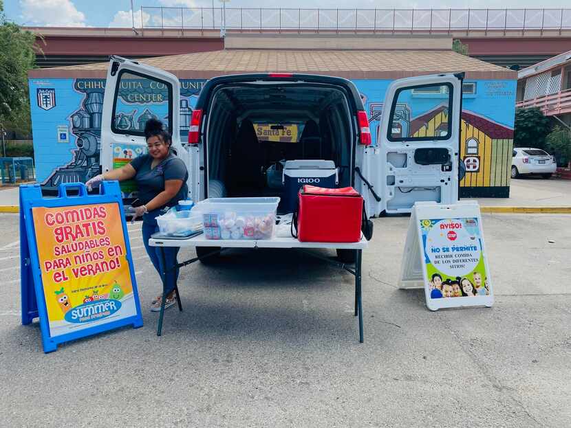 Rebecca Hernandez prepares to provide after school lunch to children in Chihuahuita, a...