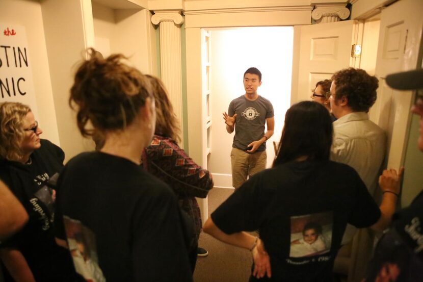 
Stefan talks to a group in the waiting area at Austin Panic Room.
