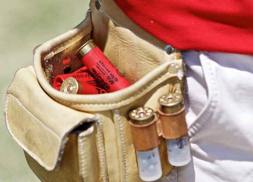 
 Junior Nick Hawkins, 16, keeps several shotgun shells in a hip pouch. 
