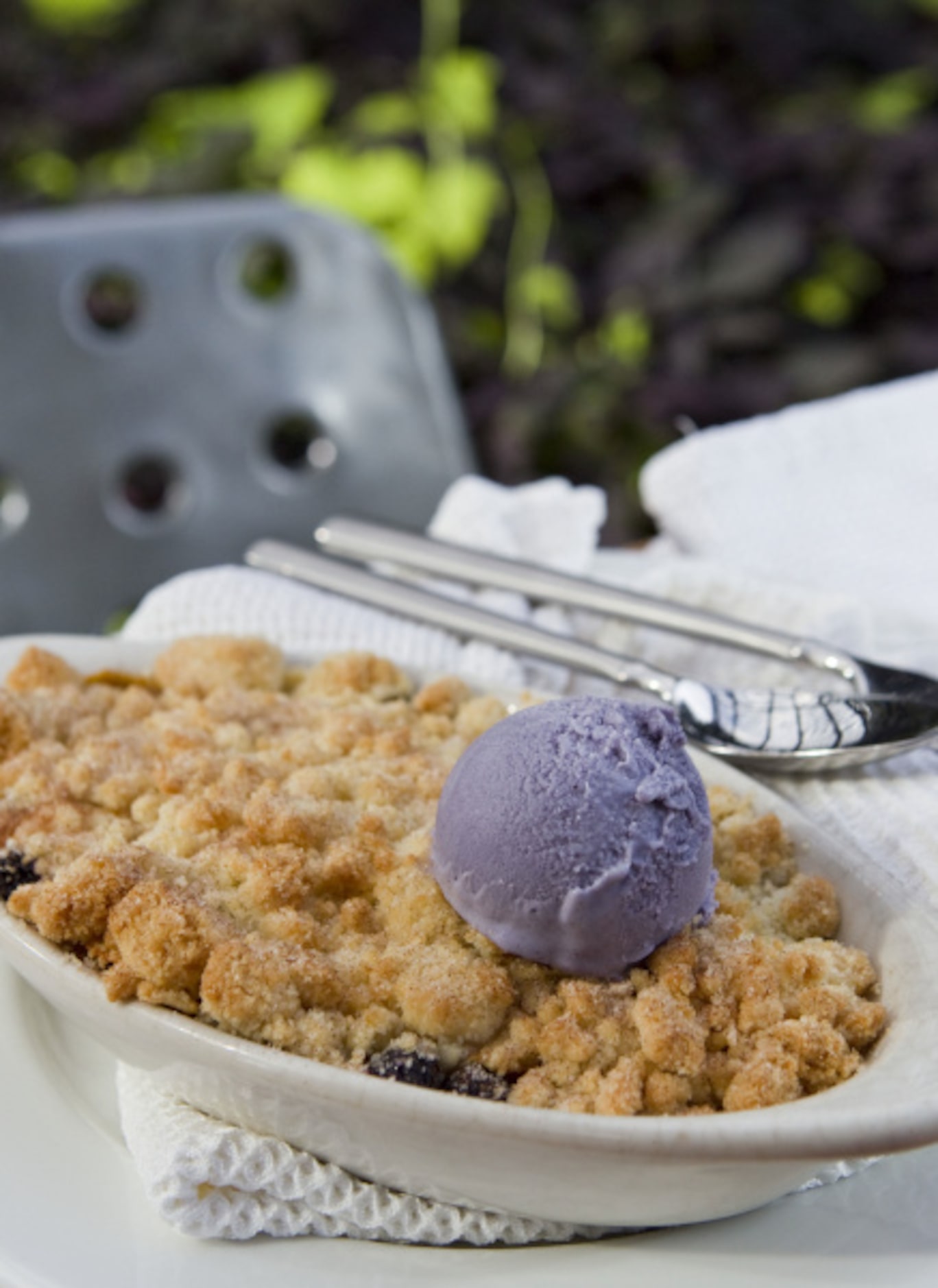 Texas peach blueberry cobbler at Acme F&B, topped with blueberry ice cream