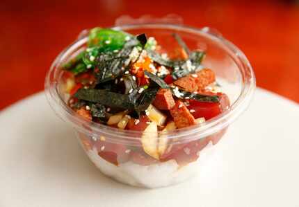A classic poke bowl at Bowls and Tacos on E. Commerce St in the Deep Ellum area of Dallas,...