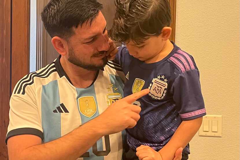 Mauro Ahumada and his son Lionel Agustín wear their Argentina national team jerseys in...