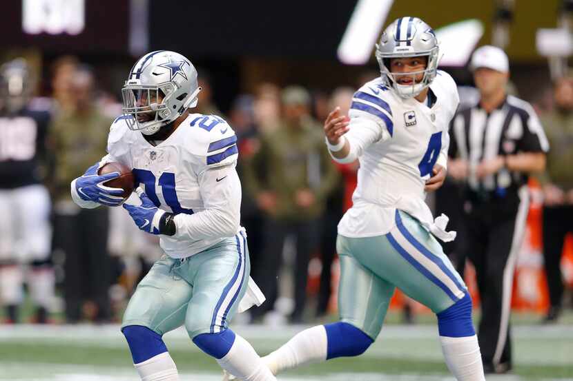 Dallas Cowboys running back Ezekiel Elliott (21) runs up the field after Dallas Cowboys...