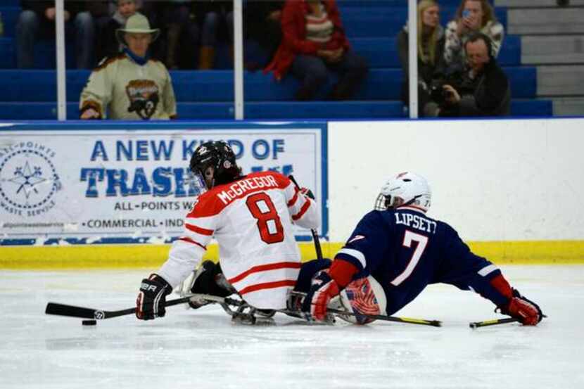 Taylor Lipsett battles for the puck during a game in Charlotte in January on the road to the...