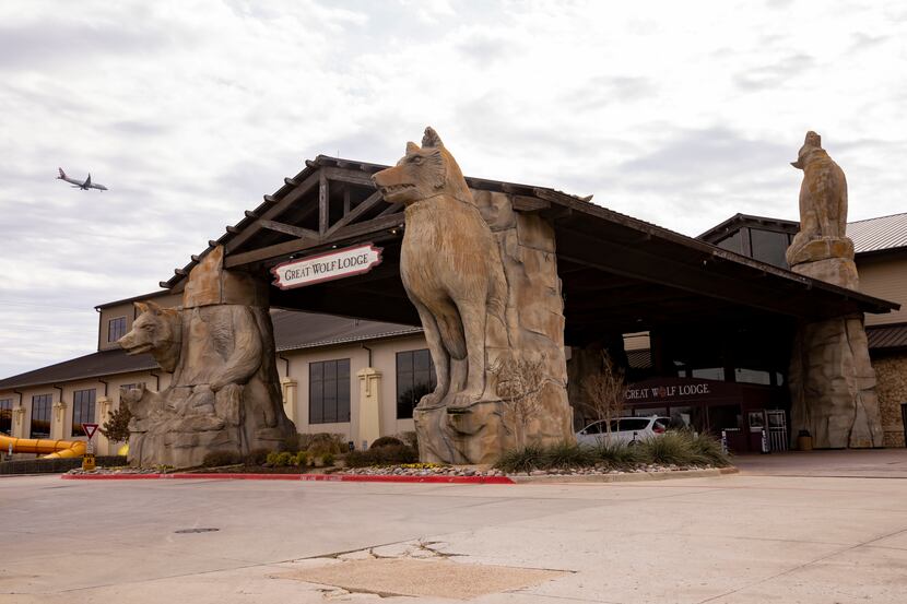 An American Airlines plane flies over Great Wolf Lodge in Grapevine on Thursday, March 2,...