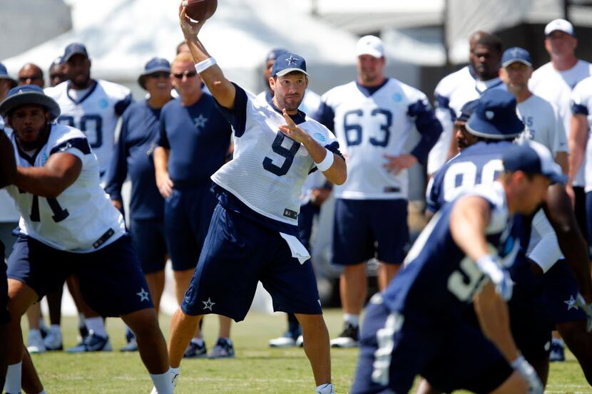 Dallas Cowboys quarterback Tony Romo (9) throws a pass during a morning walk-thru at...