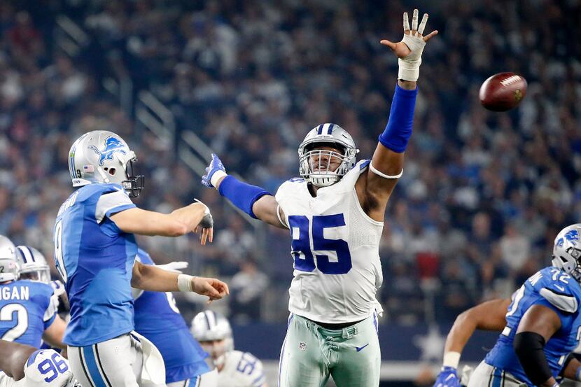 Dallas Cowboys defensive end David Irving (95) blocks a pass by Detroit Lions quarterback...