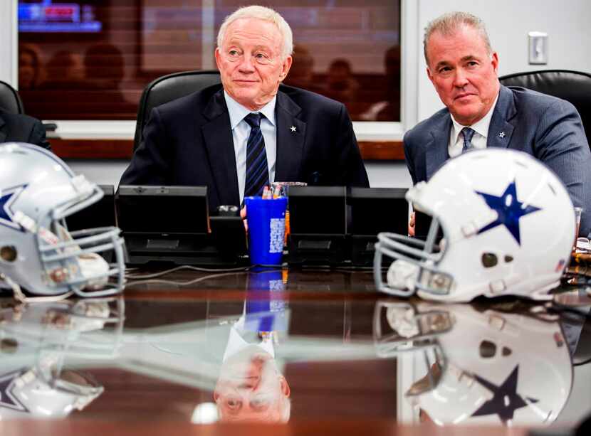 FILE - Cowboys owner Jerry Jones (left) and executive vice president Stephen Jones watch...