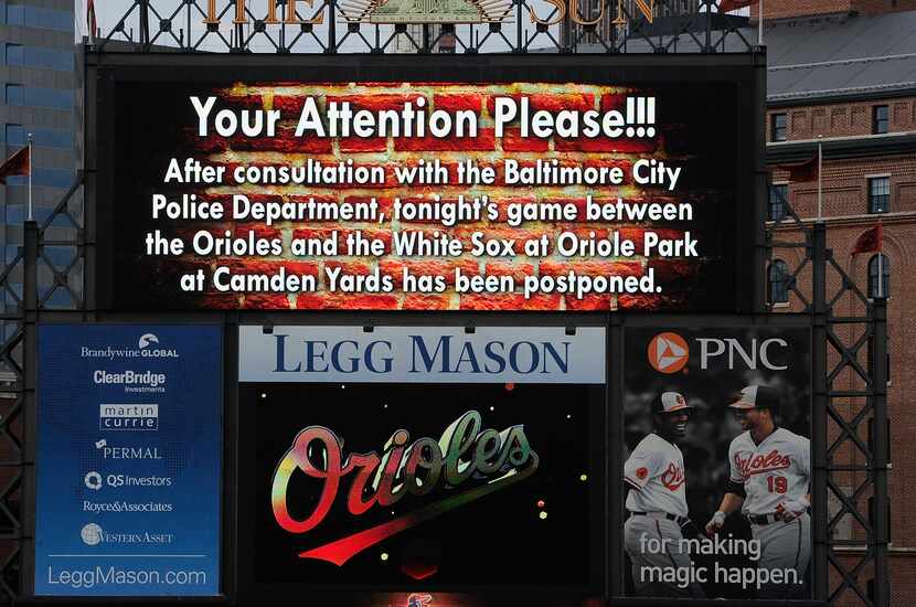 BALTIMORE, MD - APRIL 27:  An announcement on the scoreboard notifies fans that the game...