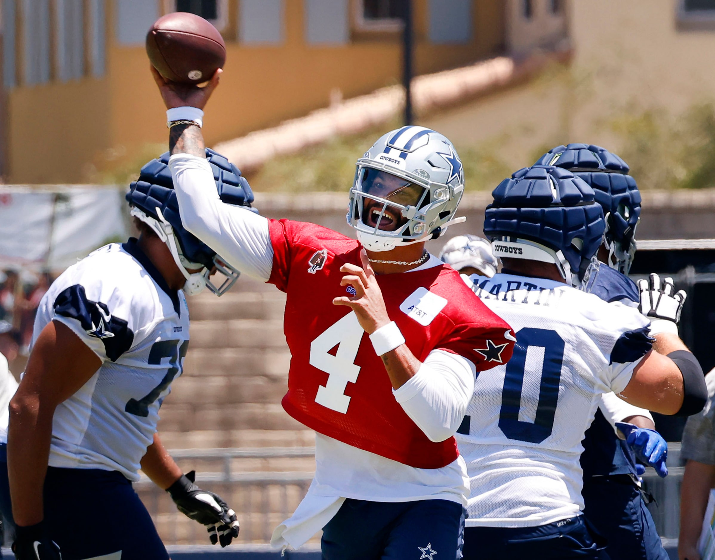 Dallas Cowboys quarterback Dak Prescott (4) fires a pass during a training camp practice in...