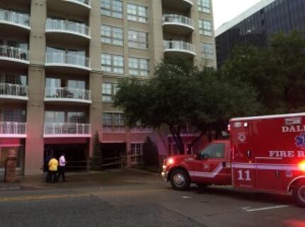 An ambulance blocks the entrance to the parking garage along Turtle Creek. (Rose Baca/Staff...