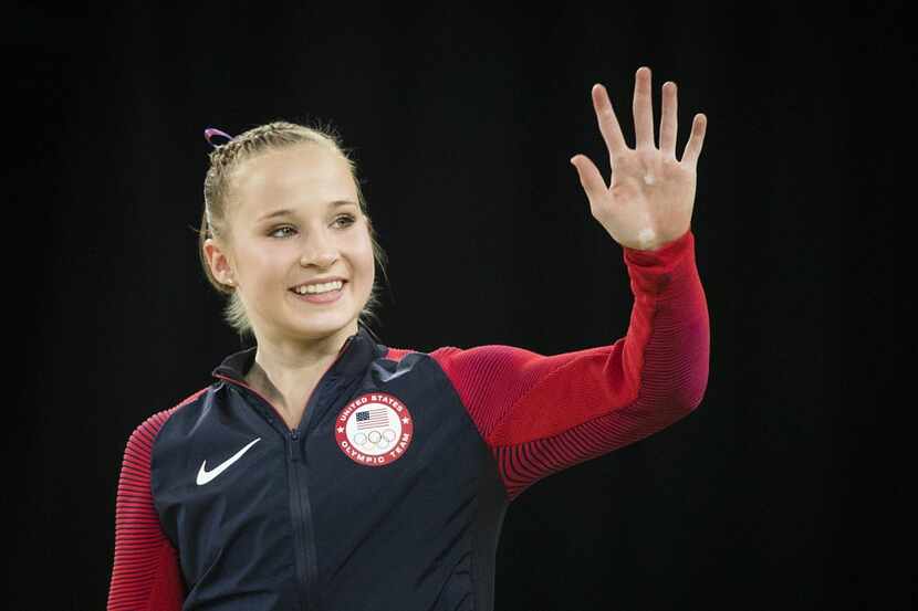 Maddie Kocian of the United States waved to the crowd as she walked to the podium to receive...