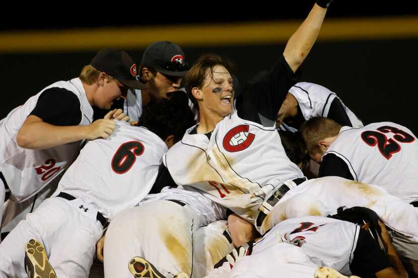 Colleyville Heritage pitcher Bobby Witt Jr. (17) raises his fist as he celebrates with his...