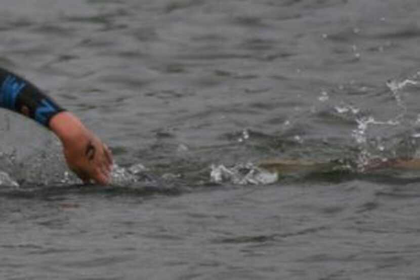 
Ariana swims in the Toyota U.S. Open Triathlon in October 2012 on her way to a first-place...