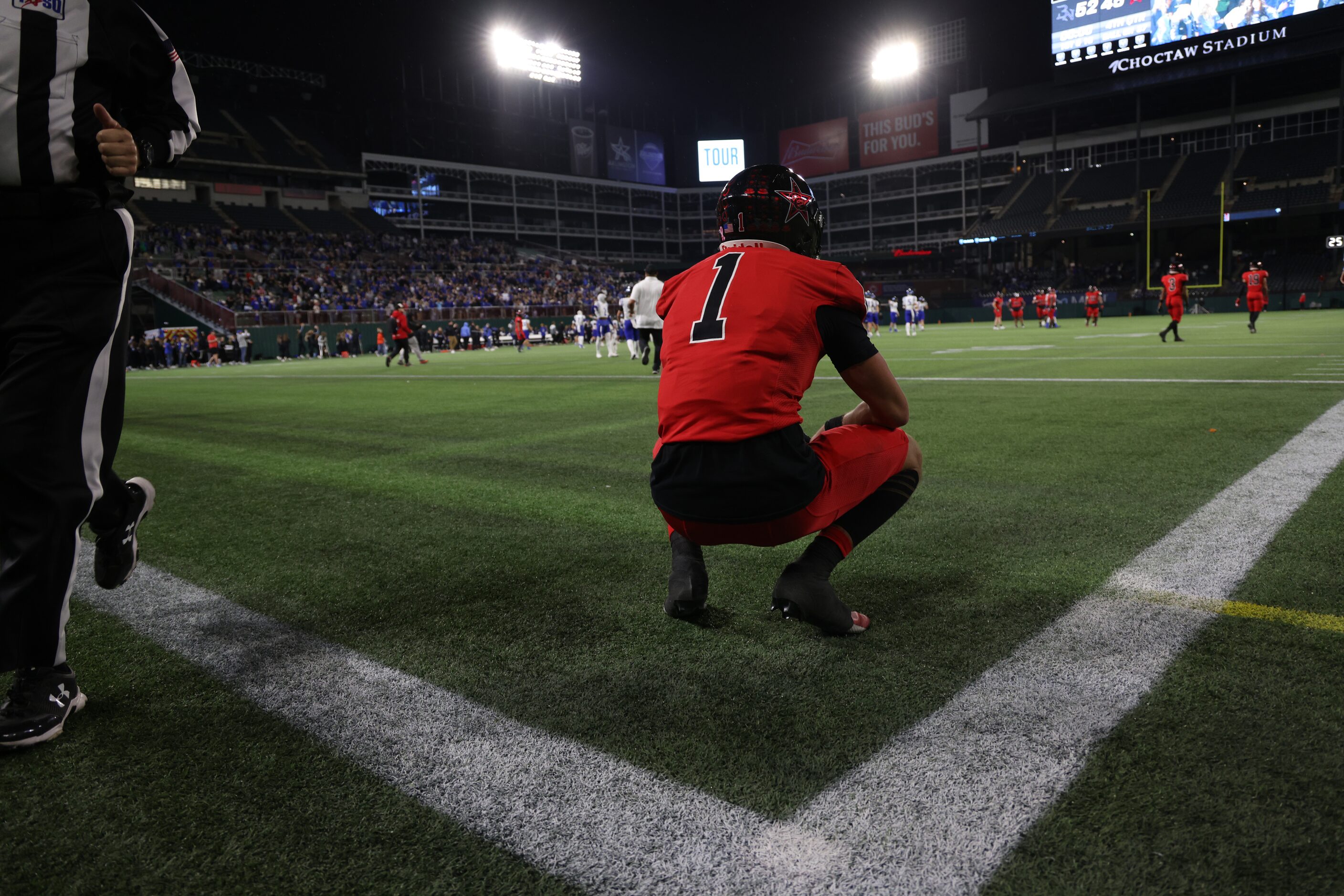 Coppell receiver Baron Tipton (1) pauses in the end zone after a last second pass fell...