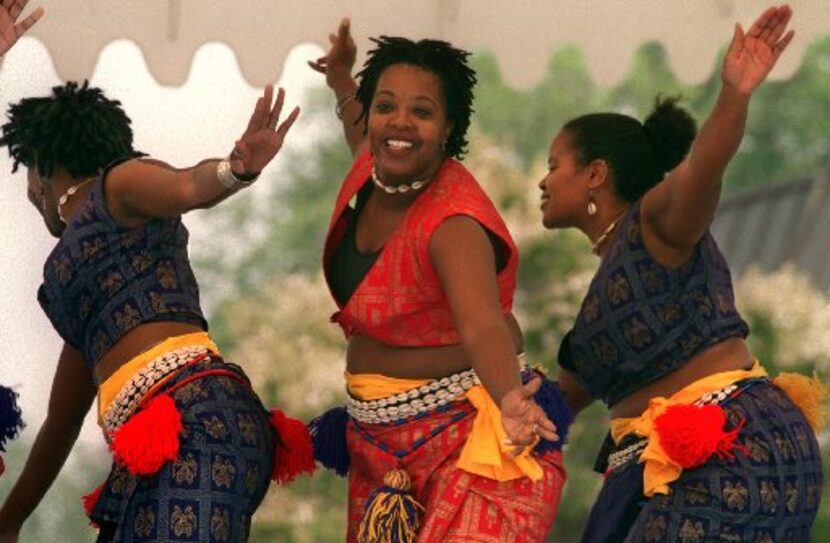 Benita Maxie, Ray-Nita Powell and Marsha Boone of Thoissan Nu Afrikan, a West African style...