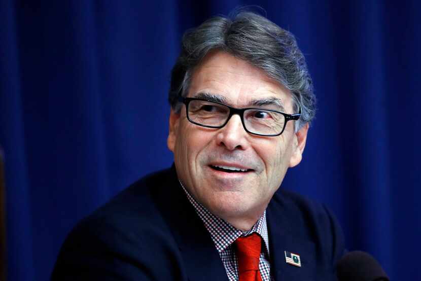 Energy Secretary Rick Perry attends a news conference at the National Press Club in...