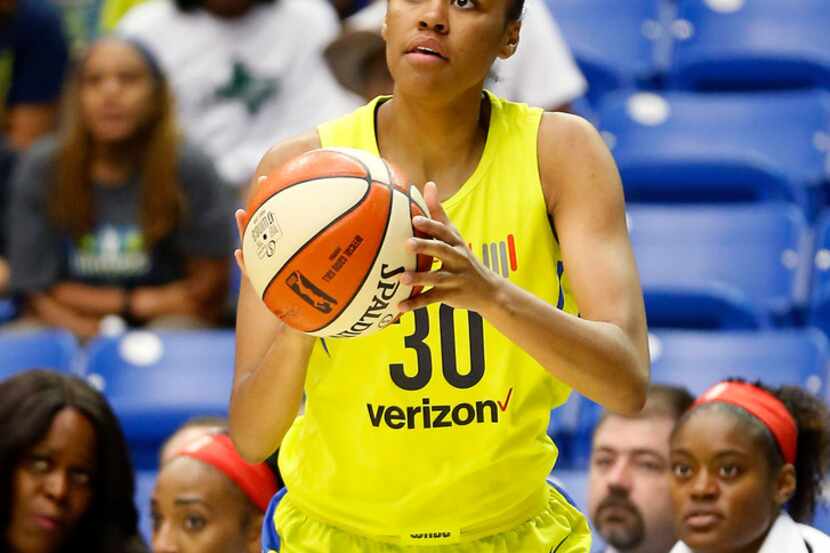 Dallas Wings forward/center Azura Stevens sets up for a three-point shot during the first...